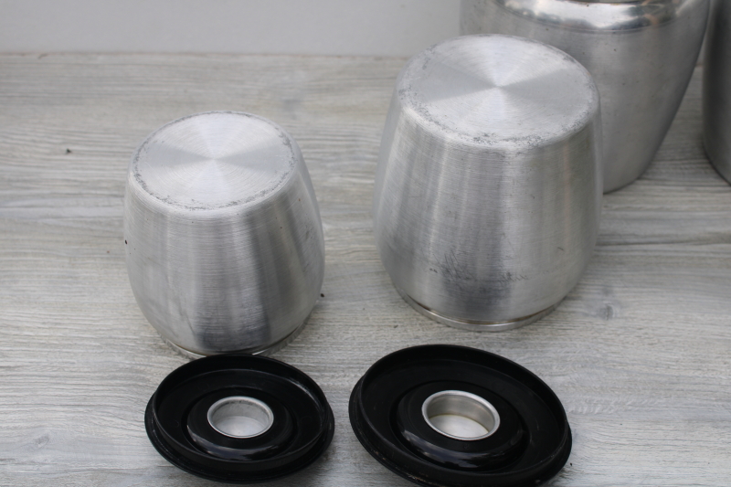 mid-century modern vintage Kromex metal canisters, spun aluminum canister set