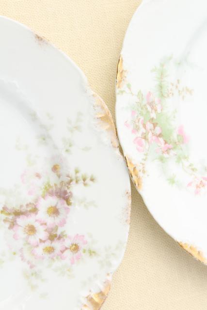 mismatched antique vintage china plates w/ different patterns, pink roses florals