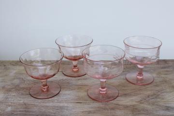 mismatched pink glass sherbet dishes or champagne glasses, vintage glassware
