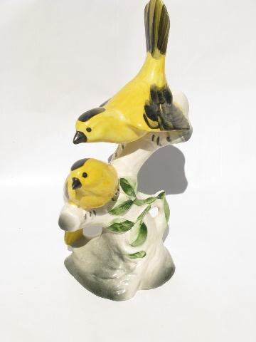 yellow ceramic bird figurine