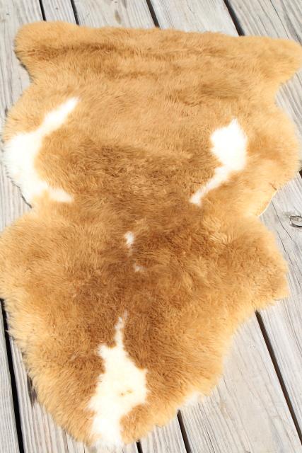 natural wool sheepskin fur rug or seat cover, brown & white hide w/ soft fuzzy pile