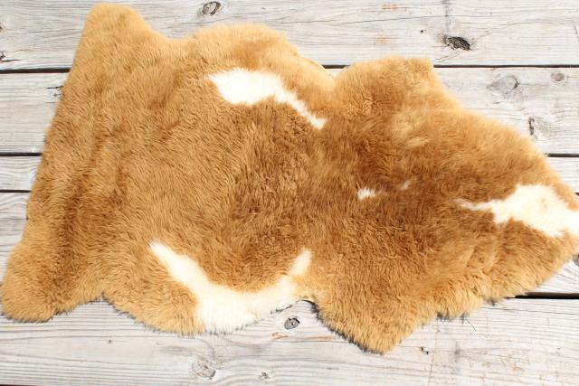 natural wool sheepskin fur rug or seat cover, brown & white hide w/ soft fuzzy pile