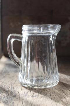 old antique pressed glass syrup pitcher, heavy rib paneled pattern glass
