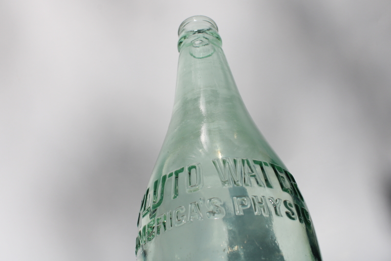 old green glass bottle embossed devil Pluto tonic water vintage quack medicine