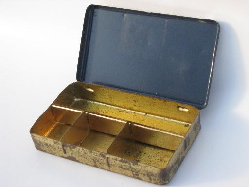 old tin box for fly fishing tackle, lures and flies - vintage fish print