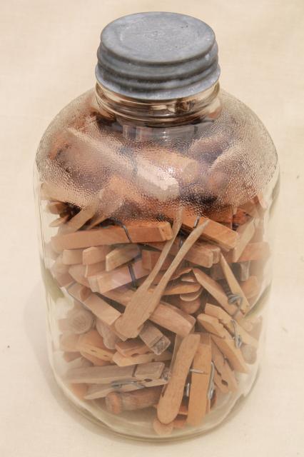 old zinc lid glass pickle jar and a gallon of vintage wood clothespins