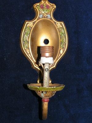 ornate antique Arts and Crafts brass wall sconce