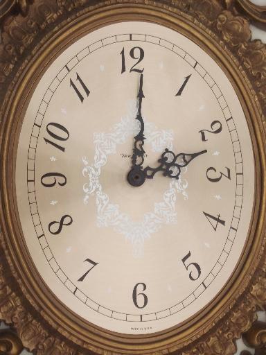 ornate antique gold rococo wall clock, Burwood plastic frame w/ New Haven clock
