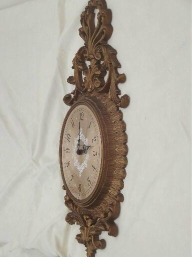ornate antique gold rococo wall clock, Burwood plastic frame w/ New Haven clock