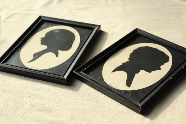 pair framed vintage silhouette paper cuts, 1940s boy & girl portraits