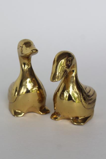pair of polished brass ducks, solid metal animal figurines w/ shiny gold color