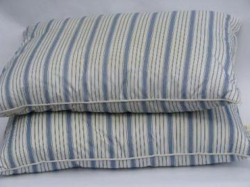 pair vintage feather pillows, blue striped cotton covers