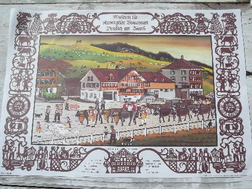 paper placemats for Oktoberfest, vintage Swiss alpine cow herd scenes