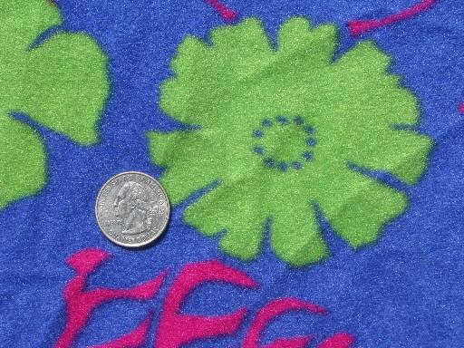 retro 80s neon tropical flowers on synthetic blue stretch velour fabric