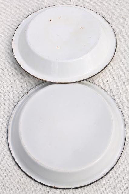 rustic vintage camp cookware - old white enamelware pans or pie plates