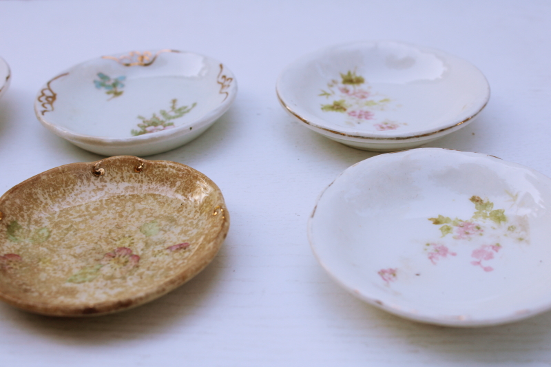 shabby antique china butter pat plates, browned stained ironstone, vintage florals