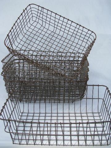 six old wire garden nurseryman's industrial storage baskets, vintage wirework
