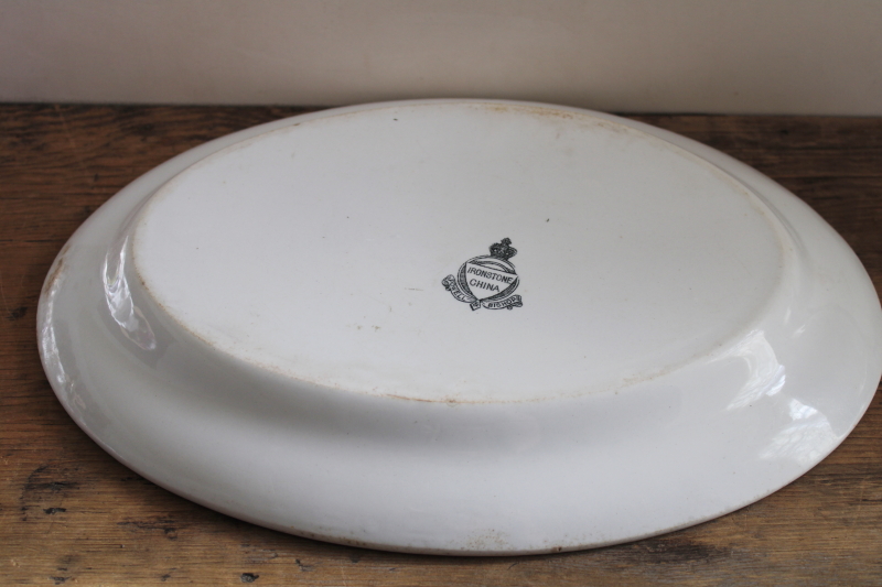 stack of antique ironstone platters, heavy white china w/ early England backstamps