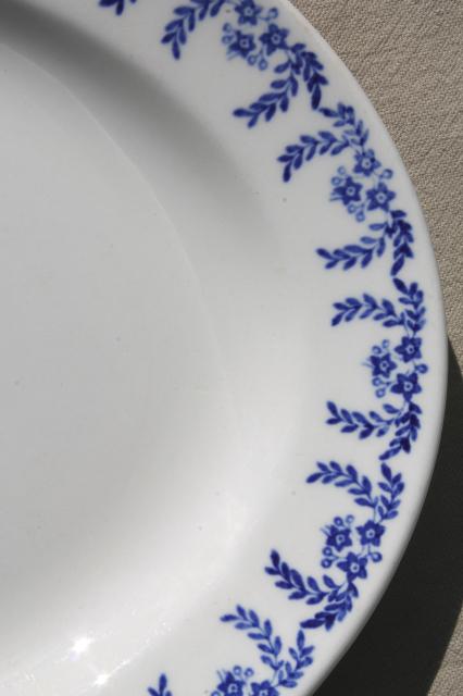 stack of vintage blue willow oval platters, blue and white chinoiserie china