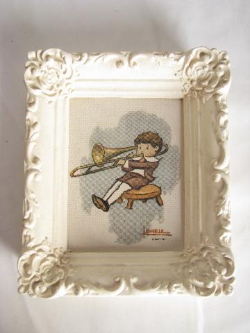 tiny vintage prints in chalkware plaster frames, the Wee Musicians