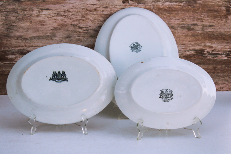 trio of heavy white ironstone china platters vintage English backstamps, stack of chunky oval plates