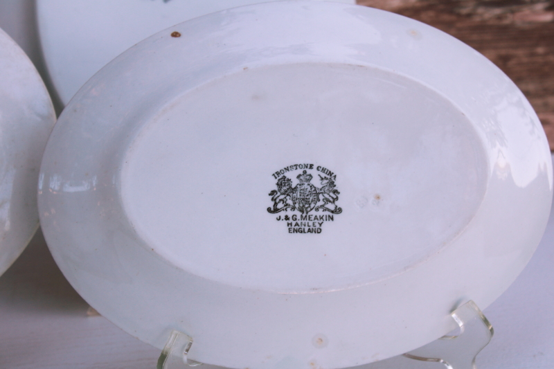 trio of heavy white ironstone china platters vintage English backstamps, stack of chunky oval plates