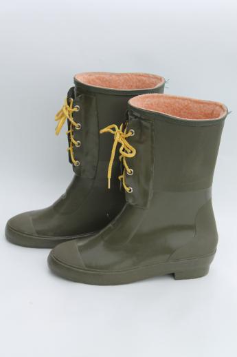 green rubber boots with yellow laces