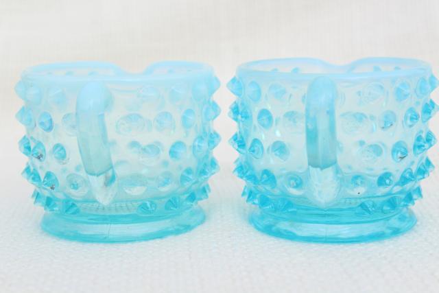 vintage Fenton blue opalescent hobnail glass mini creamers, tiny cream pitchers