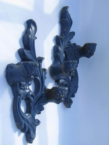 vintage Swedish blue paint, old ornate plaster wall sconces for candles