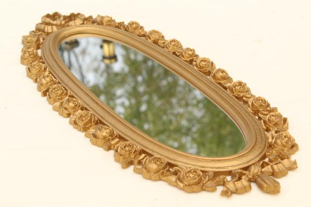 vintage Syroco gold plastic wall mirror, wreath of roses oval frame 