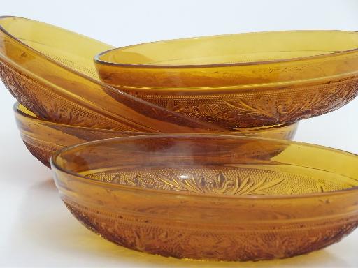 vintage Tiara sandwich glass soup bowls, daisy pattern amber glass