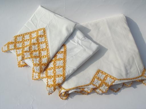 vintage bed linens, cotton pillowcases and sheets, matching gold bedspread