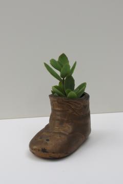vintage brass plated baby shoe planter, heavy cast metal paperweight