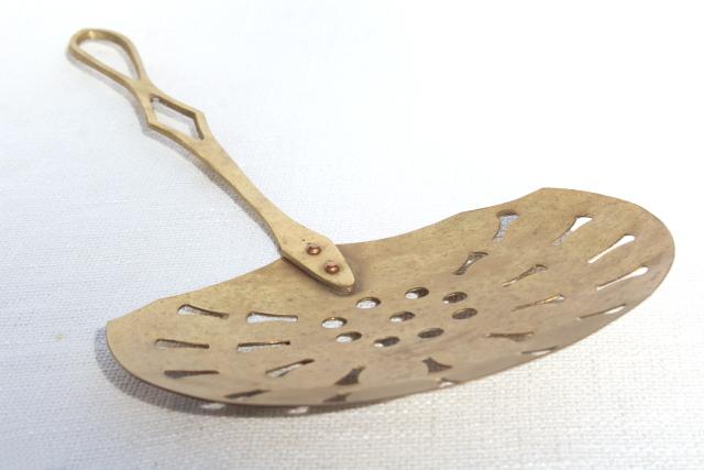 vintage brass skimmer, long handle strainer spoon, fireplace hearth or kitchen tool