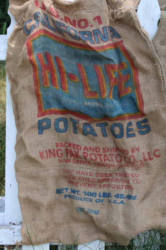 vintage burlap bags, mixed lot old potato sacks w/ colorful farm print graphics