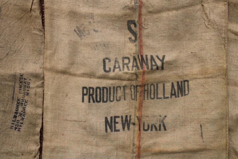 vintage burlap grain bags from Dutch caraway seed, European crown mark striped sacks