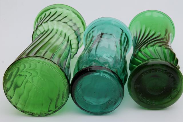 vintage collection of swirl glass flower vases in greens, teal, forest green, lime