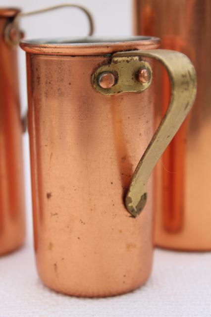 vintage copper measuring cups, set graduated measures or bar jiggers 1/4 to 1 cup size