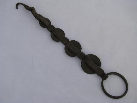 vintage farm primitive hook, old heart horse brasses, antique brass medallions on strap