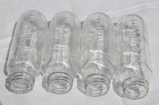 vintage glass baby bottles, lot of four 8 oz Evenflo nursing bottles 