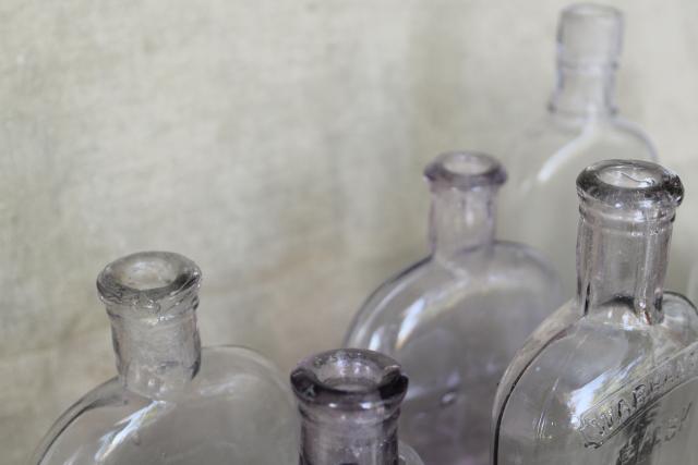 vintage glass bottles w/ old sun purple color, antique flasks pocket liquor bottle lot