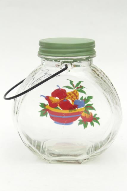 vintage glass jar kitchen canister w/ wire handle, retro fruit decal, jadite green lid