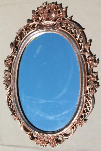 vintage gold rococo wall mirror, ornate Syroco Wood frame w\/ oval glass