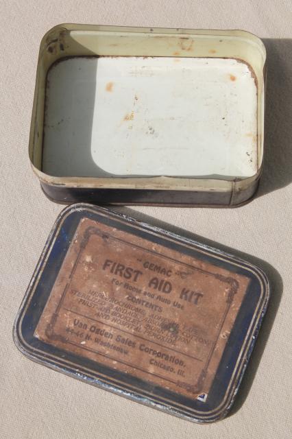 vintage industrial style metal First Aid tins, small metal boxes for bandages etc.