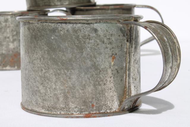 vintage kitchen tinware lot, antique tin mugs, primitive old utensils & tools