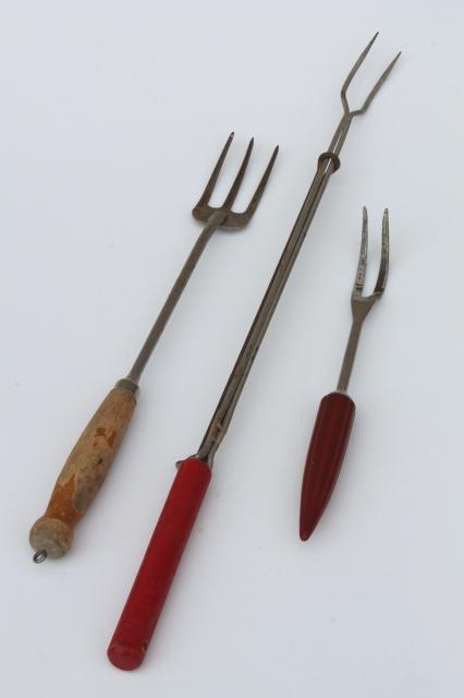 vintage kitchen utensils w/ red handles, red painted wood handled spoons, toast forks, chopper tool