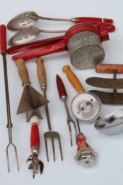 vintage kitchen utensils w/ red handles, red painted wood handled spoons, toast forks, chopper tool