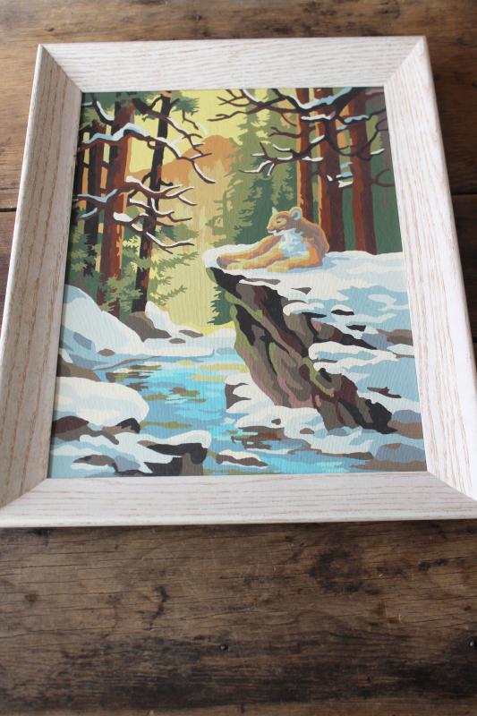 vintage paint by number picture, cougar or mountain lion winter creek north woods snow