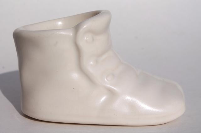 vintage pottery planters, collection of pink & blue shoes booties, baby shower decorations