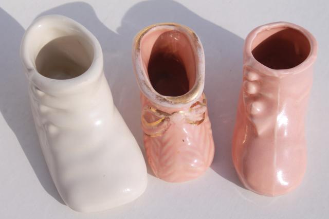 vintage pottery planters, collection of pink & blue shoes booties, baby shower decorations